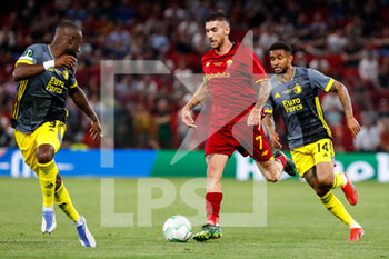 2022-05-25 - Lorenzo Pellegrini of AS Roma is challenged by Lutsharel Geertruida of Feyenoord and Reiss Nelson of Feyenoord during the UEFA Europa Conference League, Final football match between AS Roma and Feyenoord on May 25, 2022 at the National Arena in Tirana, Albania - FOOTBALL - CONFERENCE LEAGUE - FINAL - ROMA V FEYENOORD - UEFA CONFERENCE LEAGUE - SOCCER