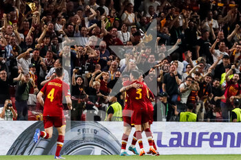 2022-05-25 - Nicolo Zaniolo of AS Roma celebrates with Roger Ibanez of AS Roma and Chris Smalling of AS Roma after scoring his sides first goal during the UEFA Europa Conference League, Final football match between AS Roma and Feyenoord on May 25, 2022 at the National Arena in Tirana, Albania - FOOTBALL - CONFERENCE LEAGUE - FINAL - ROMA V FEYENOORD - UEFA CONFERENCE LEAGUE - SOCCER