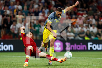 2022-05-25 - Roger Ibanez of AS Roma and Cyriel Dessers of Feyenoord during the UEFA Europa Conference League, Final football match between AS Roma and Feyenoord on May 25, 2022 at the National Arena in Tirana, Albania - FOOTBALL - CONFERENCE LEAGUE - FINAL - ROMA V FEYENOORD - UEFA CONFERENCE LEAGUE - SOCCER