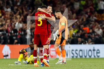 2022-05-25 - Roger Ibanez of AS Roma and Henrikh Mkhitaryan of AS Roma celebrate victory during the UEFA Europa Conference League, Final football match between AS Roma and Feyenoord on May 25, 2022 at the National Arena in Tirana, Albania - FOOTBALL - CONFERENCE LEAGUE - FINAL - ROMA V FEYENOORD - UEFA CONFERENCE LEAGUE - SOCCER