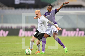 2022-09-08 - Christian Michael Kouakou Kouamé (ACF Fiorentina) and Petr Mares (FK RFS) - ACF FIORENTINA VS FK RFS - UEFA CONFERENCE LEAGUE - SOCCER
