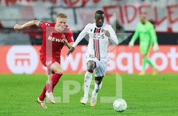 2022-11-03 - Nicolas Pepe of Nice and Kristian Pedersen of Koln during the UEFA Conference League, Group D football match between FC Koln and OGC Nice on November 3, 2022 at RheinEnergieStadion in Koln, Germany - FOOTBALL - CONFERENCE LEAGUE - KOLN V NICE - UEFA CONFERENCE LEAGUE - SOCCER