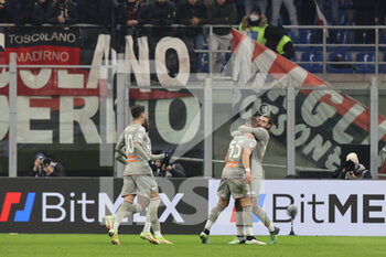 2022-01-13 - Leo Ostigard of Genoa CFC celebrates with his team mates after scoring a goal during the Coppa Italia 2021/22 football match between AC Milan and Genoa CFC at Giuseppe Meazza Stadium, Milan, Italy on January 13, 2022 - AC MILAN VS GENOA CFC - ITALIAN CUP - SOCCER