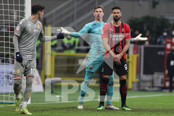 2022-01-13 - Olivier Giroud of AC Milan and Adrian Semper of Genoa CFC in action during the Coppa Italia 2021/22 football match between AC Milan and Genoa CFC at Giuseppe Meazza Stadium, Milan, Italy on January 13, 2022 - AC MILAN VS GENOA CFC - ITALIAN CUP - SOCCER