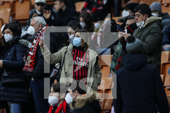 2022-01-13 - Fans wearing masks seen inside the stadium during the Coppa Italia 2021/22 football match between AC Milan and Genoa CFC at Giuseppe Meazza Stadium, Milan, Italy on January 13, 2022 - AC MILAN VS GENOA CFC - ITALIAN CUP - SOCCER