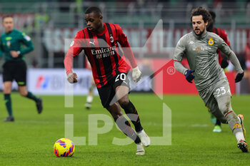 2022-01-13 - Pierre Kalulu of AC Milan in action during the Coppa Italia 2021/22 football match between AC Milan and Genoa CFC at Giuseppe Meazza Stadium, Milan, Italy on January 14, 2022 - AC MILAN VS GENOA CFC - ITALIAN CUP - SOCCER