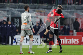 2022-01-13 - Rafael Leao of AC Milan celebrates the victory at the end of the match with Alexis Saelemaekers of AC Milan during the Coppa Italia 2021/22 football match between AC Milan and Genoa CFC at Giuseppe Meazza Stadium, Milan, Italy on January 14, 2022 - AC MILAN VS GENOA CFC - ITALIAN CUP - SOCCER