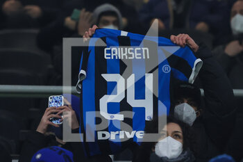 2022-01-19 - A fans in the stands show Christian Eriksen's shirt during the Coppa Italia 2021/22 football match between FC Internazionale and Empoli FC at Giuseppe Meazza Stadium, Milan, Italy on January 19, 2022 - INTER - FC INTERNAZIONALE VS EMPOLI FC - ITALIAN CUP - SOCCER