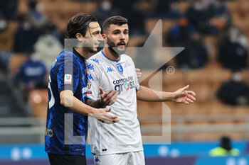 2022-01-19 - Patrick Cutrone of Empoli FC and Matteo Darmian of FC Internazionale during the Coppa Italia 2021/22 football match between FC Internazionale and Empoli FC at Giuseppe Meazza Stadium, Milan, Italy on January 19, 2022 - INTER - FC INTERNAZIONALE VS EMPOLI FC - ITALIAN CUP - SOCCER