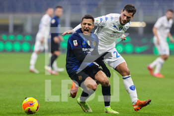 2022-01-19 - Alexis Sanchez of FC Internazionale fights for the ball against Filippo Bandinelli of Empoli FC during the Coppa Italia 2021/22 football match between FC Internazionale and Empoli FC at Giuseppe Meazza Stadium, Milan, Italy on January 19, 2022 - INTER - FC INTERNAZIONALE VS EMPOLI FC - ITALIAN CUP - SOCCER