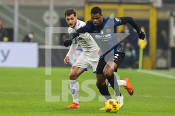 2022-01-19 - Denzel Dumfries of FC Internazionale in action during the Coppa Italia 2021/22 football match between FC Internazionale and Empoli FC at Giuseppe Meazza Stadium, Milan, Italy on January 19, 2022 - INTER - FC INTERNAZIONALE VS EMPOLI FC - ITALIAN CUP - SOCCER