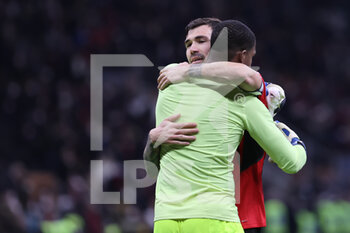 2022-02-09 - Alessio Romagnoli of AC Milan celebrates the victory at the end of the match with Mike Maignan of AC Milan during the Coppa Italia 2021/22 football match between AC Milan and SS Lazio at Giuseppe Meazza Stadium, Milan, Italy on February 09, 2022 - AC MILAN VS SS LAZIO - ITALIAN CUP - SOCCER