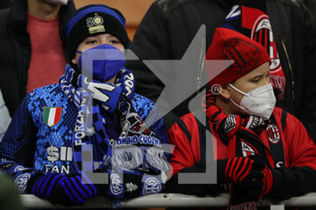2022-03-01 - Supporters of AC Milan and FC Internazionale during the Coppa Italia 2021/22 football match between AC Milan and FC Internazionale at Giuseppe Meazza Stadium, Milan, Italy on March 01, 2022 - AC MILAN VS FC INTERNAZIONALE - ITALIAN CUP - SOCCER