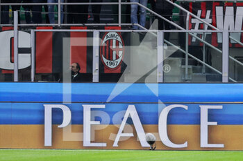 2022-03-01 - The LED screen inside the stadium shows an Ukrainian flag to indicate peace message for Ukraine during the Coppa Italia 2021/22 football match between AC Milan and FC Internazionale at Giuseppe Meazza Stadium, Milan, Italy on March 01, 2022 - AC MILAN VS FC INTERNAZIONALE - ITALIAN CUP - SOCCER