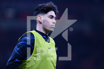 2022-03-01 - Alessandro Bastoni of FC Internazionale warms up during the Coppa Italia 2021/22 football match between AC Milan and FC Internazionale at Giuseppe Meazza Stadium, Milan, Italy on March 01, 2022 - AC MILAN VS FC INTERNAZIONALE - ITALIAN CUP - SOCCER