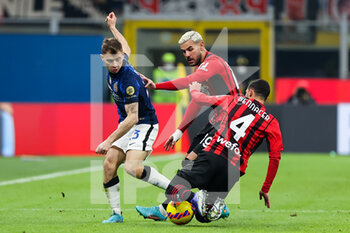 2022-03-01 - Nicolò Barella of FC Internazionale competes for the ball with Theo Hernandez of AC Milan and Ismael Bennacer of AC Milan during the Coppa Italia 2021/22 football match between AC Milan and FC Internazionale at Giuseppe Meazza Stadium, Milan, Italy on March 01, 2022 - AC MILAN VS FC INTERNAZIONALE - ITALIAN CUP - SOCCER