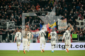 2022-04-20 - Leonardo Bonucci of Juventus Fc, Moise Kean of Juventus Fc, Adrien Rabiot of Juventus Fc, Matthijs De Light of Juventus Fc, Mattia De Sciglio of Juventus Fc and Federico Bernardeschi of Juventus Fc celebrating with supporters during the Italian Cup, Coppa Italia, semi-finals 2nd leg football match between Juventus FC and ACF Fiorentina on April 20, 2022 at Allianz stadium in Turin, Italy - JUVENTUS FC VS ACF FIORENTINA - ITALIAN CUP - SOCCER