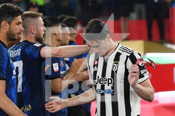 2022-05-11 - ROME, ITALY - May 11 : Dusan Vlahovic of FC Juventus takes off the medal during  the  Italian Cup final  soccer match between  FC Juventus and Inter Milan FC at Stadio Olimpico on May 11,2022 in Rome, Italy.  - FINAL 2021/2022 - JUVENTUS FC VS INTER - FC INTERNAZIONALE - ITALIAN CUP - SOCCER