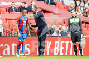 2022-04-17 - Crystal Palace manager Patrick Vieira speaks to substitute Crystal Palace forward Jordan Ayew (9) during the English FA Cup, semi-final football match between Chelsea and Crystal Palace on April 17, 2022 at Wembley Stadium in London, England - CHELSEA VS CRYSTAL PALACE - ENGLISH LEAGUE CUP - SOCCER