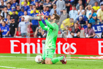 2022-05-14 - Alisson Becker (1) of Liverpool reacts to saving a penalty during the penalty shootout during the English FA Cup, Final football match between Chelsea and Liverpool on May 14, 2022 at Wembley Stadium in London, England - FINAL - CHELSEA VS LIVERPOOL - ENGLISH LEAGUE CUP - SOCCER