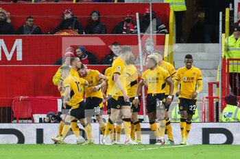 2022-01-04 - Wolverhampton Wanderers midfielder Joao Moutinho (28) celebrates his goal 0-1 with teammates during the English championship Premier League football match between Manchester United and Wolverhampton Wanderers on January 3, 2022 at Old Trafford in Manchester, England - MANCHESTER UNITED VS WOLVERHAMPTON WANDERERS - ENGLISH PREMIER LEAGUE - SOCCER