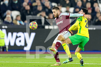 2022-01-12 - Nikola Vlasic (11) of West Ham United tussles with Pierre Lees-Melou (20) of Norwich City during the English championship Premier League football match between West Ham United and Norwich City on 12 January 2022 at the London Stadium in London, England - WEST HAM UNITED VS NORWICH CITY - ENGLISH PREMIER LEAGUE - SOCCER