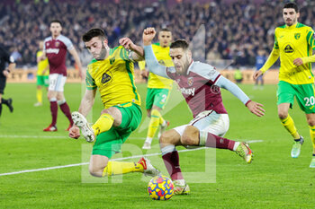 2022-01-12 - Nikola Vlasic (11) of West Ham United blocked by Grant Hanley (5) of Norwich City during the English championship Premier League football match between West Ham United and Norwich City on 12 January 2022 at the London Stadium in London, England - WEST HAM UNITED VS NORWICH CITY - ENGLISH PREMIER LEAGUE - SOCCER