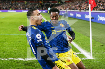 2022-01-20 - Manchester United striker Mason Greenwood (11) celebrates his goal 0-2 with Anthony Elanga during the English championship Premier League football match between Brentford and Manchester United on January 19, 2022 at Brentford Community Stadium in Brentford, England - BRENTFORD VS MANCHESTER UNITED - ENGLISH PREMIER LEAGUE - SOCCER