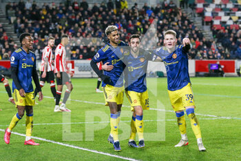 2022-01-20 - Manchester United Forward Marcus Rashford (10) celebrates his goal 0-3 with Bruno Fernandes, Scott McTominay during the English championship Premier League football match between Brentford and Manchester United on January 19, 2022 at Brentford Community Stadium in Brentford, England - BRENTFORD VS MANCHESTER UNITED - ENGLISH PREMIER LEAGUE - SOCCER