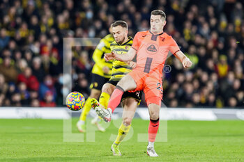 2022-01-21 - Kenny McLean (23) of Norwich City battles with Tom Cleverley (8) of Watford during the English championship Premier League football match between Watford and Norwich City on January 21, 2022 at Vicarage Road in Watford, England - WATFORD VS NORWICH CITY - ENGLISH PREMIER LEAGUE - SOCCER