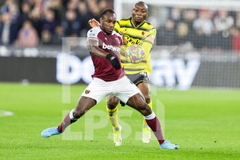 2022-02-08 - Michail Antonio (9) of West Ham United tussles with Edo Kayembe (39) of Watford during the English championship Premier League football match between West Ham United and Watford on February 8, 2022 at the London Stadium in London, England - WEST HAM UNITED VS WATFORD - ENGLISH PREMIER LEAGUE - SOCCER