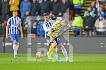 2022-02-12 - Brighton and Hove Albion midfielder Jakub Moder (15) and Watford midfielder Juraj Kucka (33) during the English championship Premier League football match between Watford and Brighton and Hove Albion on February 12, 2022 at Vicarage Road in Watford, England - WATFORD VS BRIGHTON AND HOVE ALBION - ENGLISH PREMIER LEAGUE - SOCCER