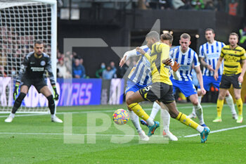 2022-02-12 - Watford forward Emmanuel Dennis during the English championship Premier League football match between Watford and Brighton and Hove Albion on February 12, 2022 at Vicarage Road in Watford, England - WATFORD VS BRIGHTON AND HOVE ALBION - ENGLISH PREMIER LEAGUE - SOCCER