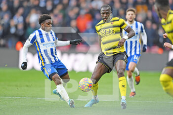 2022-02-12 - Brighton and Hove Albion defender Tariq Lamptey (2) and Watford Moussa Sissoko during the English championship Premier League football match between Watford and Brighton and Hove Albion on February 12, 2022 at Vicarage Road in Watford, England - WATFORD VS BRIGHTON AND HOVE ALBION - ENGLISH PREMIER LEAGUE - SOCCER