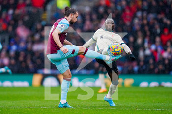 2022-02-13 - Liverpool midfielder Naby Keita (8) and Burnley forward Jay Rodriguez (19) during the English championship Premier League football match between Burnley and Liverpool on February 13, 2022 at Turf Moor in Burnley, England - BURNLEY VS LIVERPOOL - ENGLISH PREMIER LEAGUE - SOCCER