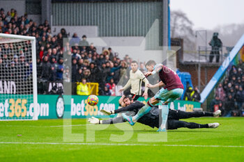 2022-02-13 - Liverpool goalkeeper Alisson Becker (1) saves Burnley forward Wout Weghorst (9) shot during the English championship Premier League football match between Burnley and Liverpool on February 13, 2022 at Turf Moor in Burnley, England - BURNLEY VS LIVERPOOL - ENGLISH PREMIER LEAGUE - SOCCER