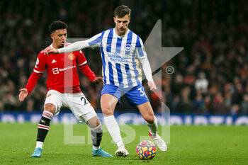 2022-02-16 - Brighton and Hove Albion defender Joel Veltman (34) battles with Manchester United Midfielder Jadon Sancho (25) during the English championship Premier League football match between Manchester United and Brighton and Hove Albion on February 15, 2022 at Old Trafford in Manchester, England - MANCHESTER UNITED VS BRIGHTON AND HOVE ALBION - ENGLISH PREMIER LEAGUE - SOCCER