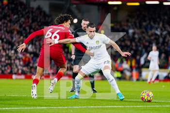 2022-02-23 - Leeds United midfielder Jack Harrison (22) and Trent Alexander-Arnold of Liverpool during the English championship Premier League football match between Liverpool and Leeds United on February 23, 2022 at Anfield stadium in Liverpool, England - LIVERPOOL VS LEEDS UNITED - ENGLISH PREMIER LEAGUE - SOCCER