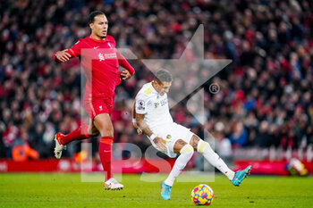 2022-02-23 - Liverpool defender Virgil van Dijk (4) tackles Leeds United forward Raphinha (10) during the English championship Premier League football match between Liverpool and Leeds United on February 23, 2022 at Anfield stadium in Liverpool, England - LIVERPOOL VS LEEDS UNITED - ENGLISH PREMIER LEAGUE - SOCCER