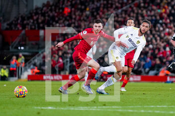 2022-02-23 - Leeds United forward Tyler Roberts (11) Liverpool defender Andrew Robertson (26) during the English championship Premier League football match between Liverpool and Leeds United on February 23, 2022 at Anfield stadium in Liverpool, England - LIVERPOOL VS LEEDS UNITED - ENGLISH PREMIER LEAGUE - SOCCER