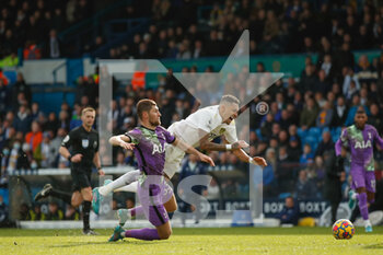 2022-02-26 - Leeds United midfielder Raphinha (10) is fouled by Tottenham Hotspur defender Ben Davies during the English championship Premier League football match between Leeds United and Tottenham Hotspur on February 26, 2022 at Elland Road in Leeds, England - LEEDS UNITED VS TOTTENHAM HOTSPUR - ENGLISH PREMIER LEAGUE - SOCCER