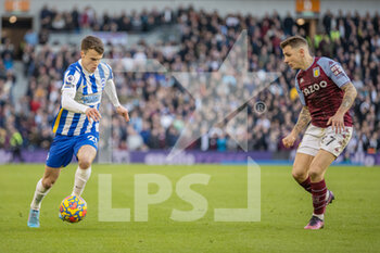 2022-02-26 - Brighton and Hove Albion midfielder Solly March (20) & Aston Villa defender Lucas Digne (27) during the English championship Premier League football match between Brighton and Hove Albion and Aston Villa on February 26, 2022 at the American Express Community Stadium in Brighton and Hove, England - BRIGHTON AND HOVE ALBION VS ASTON VILLA - ENGLISH PREMIER LEAGUE - SOCCER