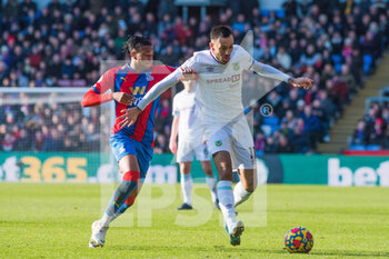 2022-02-26 - Burnley midfielder Dwight McNeil (11) and Crystal Palace midfielder Michael Olise (7) during the English championship Premier League football match between Crystal Palace and Burnley on February 26, 2022 at Selhurst Park in London, England - CRYSTAL PALACE VS BURNLEY - ENGLISH PREMIER LEAGUE - SOCCER