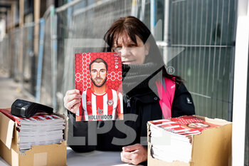 2022-02-26 - Christian Eriksen appears on the front cover of the match day programme during the English championship Premier League football match between Brentford and Newcastle United on February 26, 2022 at Brentford Community Stadium in Brentford, England - BRENTFORD VS NEWCASTLE UNITED - ENGLISH PREMIER LEAGUE - SOCCER