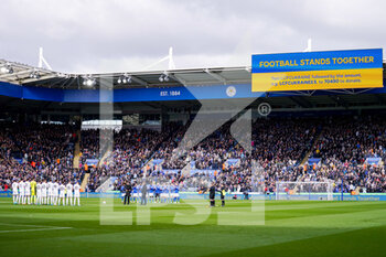 2022-03-05 - Both teams line up in support of Ukraine during the English championship Premier League football match between Leicester City and Leeds United on March 5, 2022 at the King Power Stadium in Leicester, England - LEICESTER CITY VS LEEDS UNITED - ENGLISH PREMIER LEAGUE - SOCCER