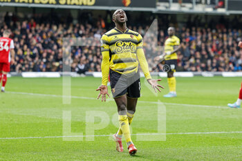 2022-03-06 - Hassane Kamara (14) of Watford reacts during the English championship Premier League football match between Watford and Arsenal on March 6, 2022 at Vicarage Road in Watford, England - WATFORD VS ARSENAL - ENGLISH PREMIER LEAGUE - SOCCER