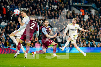 2022-03-10 - Leeds United forward Patrick Bamford (9) takes a shot during the English championship Premier League football match between Leeds United and Aston Villa on March 10, 2022 at Elland Road in Leeds, England - LEEDS UNITED VS ASTON VILLA - ENGLISH PREMIER LEAGUE - SOCCER