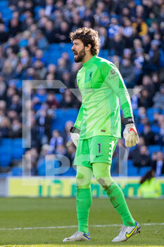 2022-03-12 - Liverpool goalkeeper Alisson Becker during the English championship Premier League football match between Brighton and Hove Albion and Liverpool on March 12, 2022 at the American Express Community Stadium in Brighton and Hove, England - BRIGHTON AND HOVE ALBION VS LIVERPOOL - ENGLISH PREMIER LEAGUE - SOCCER