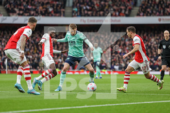 2022-03-13 - Harvey Barnes (7) of Leicester City and Thomas Partey (5) of Arsenal during the English championship Premier League football match between Arsenal and Leicester City on March 13, 2022 at the Emirates Stadium in London, England - ARSENAL VS LEICESTER CITY - ENGLISH PREMIER LEAGUE - SOCCER