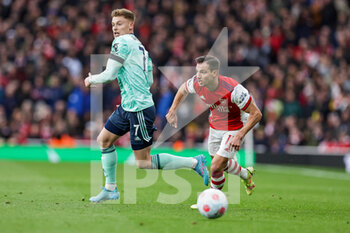 2022-03-13 - Cedric Soares (17) of Arsenal tussles with Harvey Barnes (7) of Leicester City during the English championship Premier League football match between Arsenal and Leicester City on March 13, 2022 at the Emirates Stadium in London, England - ARSENAL VS LEICESTER CITY - ENGLISH PREMIER LEAGUE - SOCCER